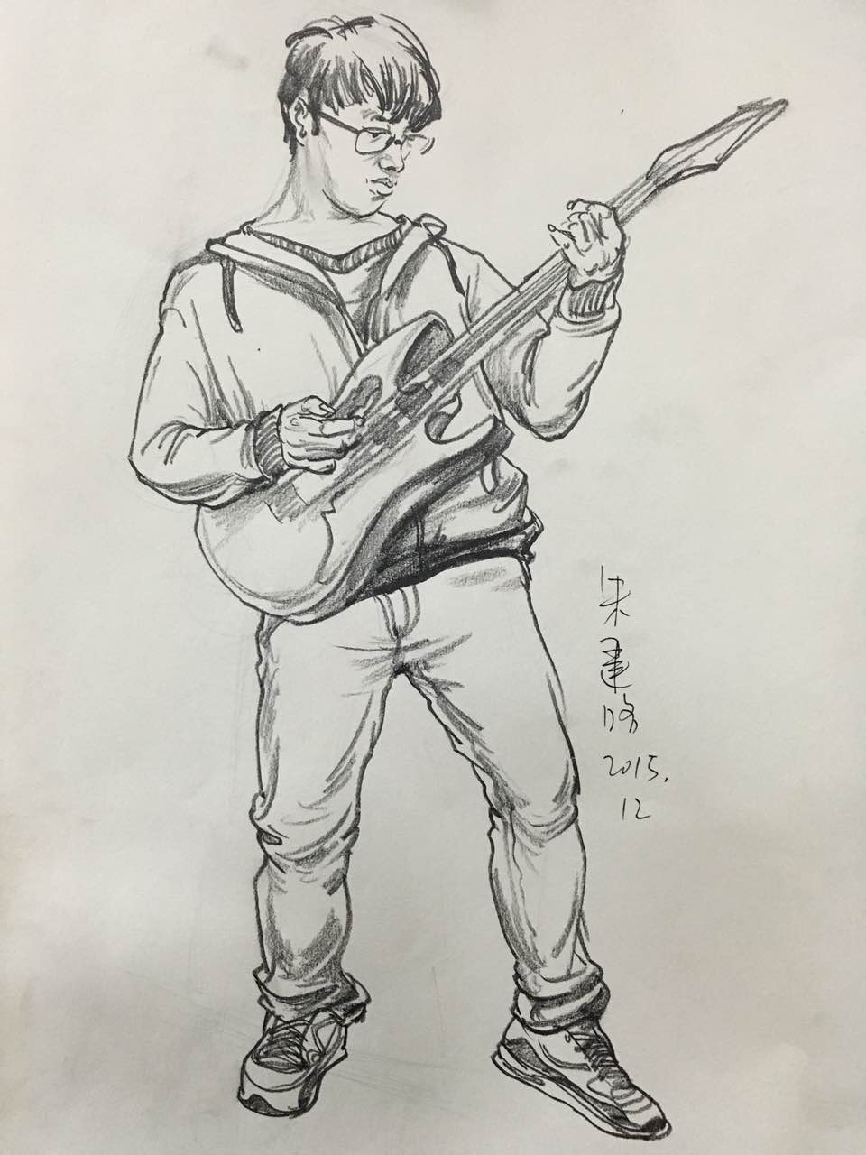 朱建路老師人物速寫吉他男孩范畫賞析